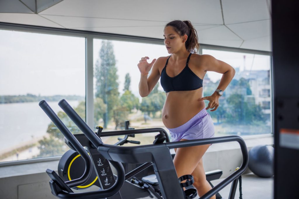 Pregnant woman walking for exercise during pregnancy